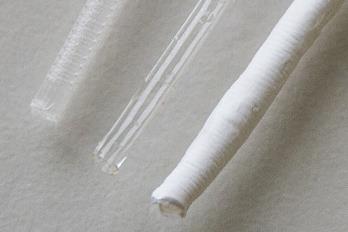 Blood vessel equivalents: Porous tubes with inner diameters of 1 mm to 2 mm From left to right: laserfabricated tube with 120 μm pores, crosslinked gelatin hydrogel tube, electrospun poly(ester-urethane-urea) tube.